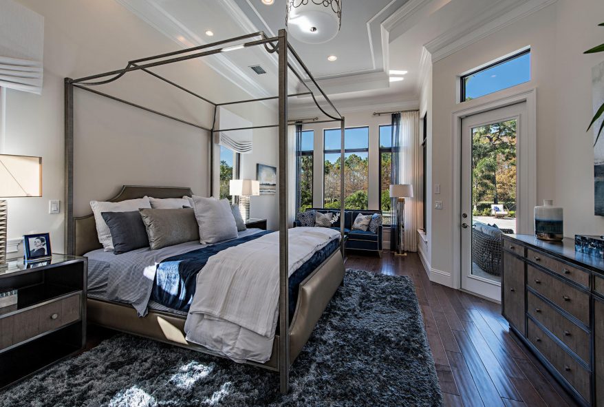 cozy bedroom design with warm lighting and soft neutral finishes for a comfortable winter retreat