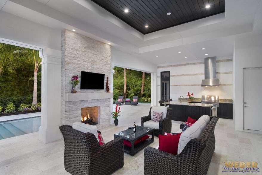 Winter outdoor living with covered patio, outdoor heaters, insulated features, and weather-rated flooring for year-round comfort