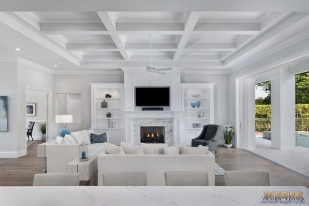 Great room layout with fireplace and indoor outdoor connection supporting smart floor plan design