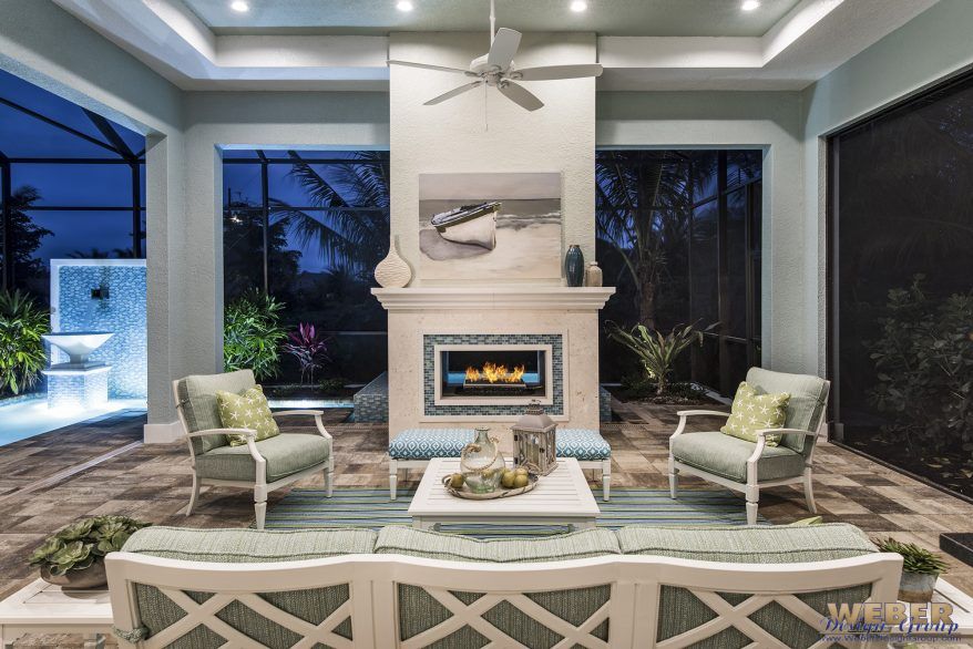 Covered outdoor living space with fireplace designed for everyday use and flexible home layouts