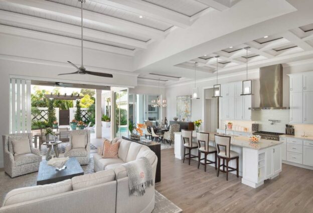 Open concept house plan with indoor outdoor living and large sliding glass doors